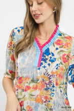 Umgee floral contrast pleat neck top with vibrant floral print blouse and colorful blue and pink ruffled collar