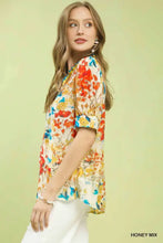 Umgee floral contrast pleat neck blouse in vibrant honey mix floral print on light cream base fabric