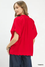 Umgee floral embroidered hem blouse in vibrant red with loose fit, short flutter sleeves, and scalloped hemline