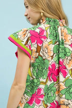 Umgee floral print blouse with high neckline and short flutter sleeves featuring bold pink flowers on off-white background