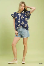 Navy blue Umgee floral ruffle sleeve split neck top with cream floral pattern and ruffled short sleeves