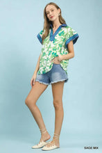 Umgee green and white floral split neck top with blue trim short sleeves perfect for casual wear