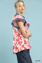 Umgee floral split neck blouse with vibrant red and white floral print and navy blue ruffled sleeves