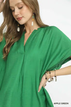 Apple green umgee flowy v-neck short sleeve blouse with wide sleeves and relaxed fit for casual wear