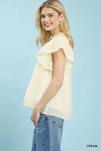 Cream-colored umgee flutter sleeve relaxed top with ruffled sleeves and hem featuring delicate lace trim