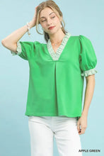 Apple green umgee french terry ruffle trim puff sleeve top with striped pattern and ruffled collar and cuffs