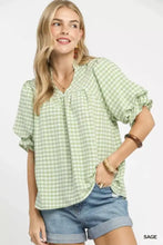Light green and white gingham puff sleeve babydoll blouse by Umgee with ruffled sleeves in lightweight fabric