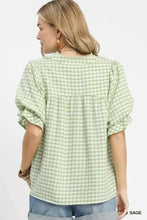 Light green and white gingham Umgee blouse with puffed sleeves in a lightweight babydoll style design