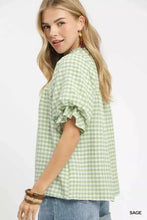 Light green and white gingham Umgee blouse with puffed ruffled short sleeves in lightweight fabric