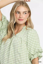 Umgee gingham puff sleeve babydoll blouse in soft sage green and white with ruffled neckline and puffed sleeves