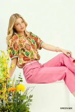 Umgee jacquard abstract paisley print top with vibrant green red orange and beige floral pattern short sleeves