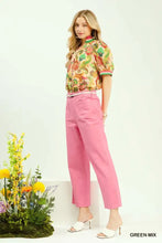 Pink high-waisted cropped trousers with straight-leg cut and front pockets paired with umgee jacquard abstract top