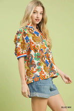 Vibrant multi-colored paisley print blouse with short sleeves and collar in umgee jacquard abstract fabric