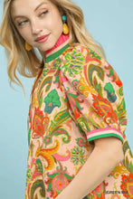 A vibrant pink Umgee jacquard abstract print top with bold paisley print, puffed sleeves, and green trim high collar