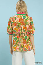 Umgee jacquard abstract vibrant short-sleeved blouse with retro paisley print in green orange and pink on peach background
