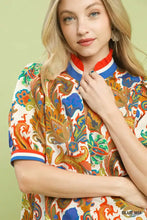 Umgee jacquard abstract short-sleeved blouse with vibrant orange blue green paisley print and red white blue trim