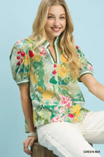 Vibrant green mix floral print umgee jacquard bloomscape top with puff sleeves and v-neckline in jacquard bloomscape fabric