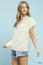Off-white umgee lace button-front top with short sleeves made of delicate lace fabric