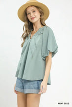 Mint blue umgee lace inset boho blouse with delicate eyelet embroidery and puffed short sleeves
