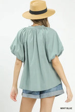 Mint blue umgee lace inset boho blouse with puffed sleeves and a gathered neckline for a stylish look