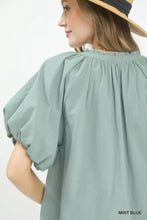 Mint blue umgee lace inset boho blouse with puffy sleeves and ruffled neckline made from lightweight fabric