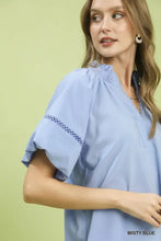Misty blue umgee lace trim peasant top with delicate lace trim sleeves and smocked neckline in lightweight fabric