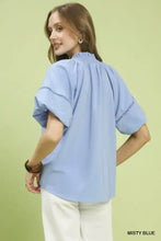 Misty blue umgee lace trim peasant top with short puffed sleeves and delicate lace trim along armholes