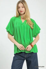 Bright green umgee linen v neck flutter sleeve blouse with ruffled short sleeves and flowing linen fabric
