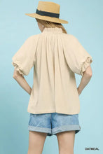Beige oatmeal umgee linen blouse with flutter sleeve ruffles and gathered high neckline, linen v neck style