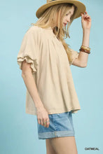 Beige umgee linen v neck flutter sleeve top with ruffled short sleeves and pleated neckline in lightweight linen fabric