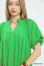 Vibrant green umgee linen v neck flutter sleeve top with loose fit puffed sleeves and ruffled neckline