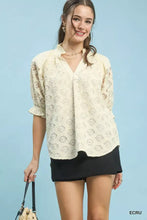 Cream-colored umgee linen v-neck lace puff sleeve blouse with elegant lace puff design and puff sleeves