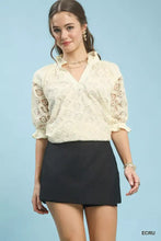 Umgee linen v-neck cream-colored lace puff sleeve blouse with ruffled cuffs and delicate lace puff detailing
