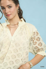 Cream-colored Umgee linen V-neck blouse with floral embroidery and lace puff sleeve ruffled details