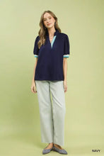 Umgee luxe knit puff sleeve top in navy blue with light blue contrast trim on v-neckline and sleeve cuffs