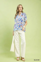 Blue and white floral print short-sleeved blouse with v-neckline in umgee mix boho printed style