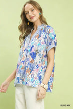 Umgee mix boho printed short-sleeved blouse in vibrant blue with intricate botanical print on lightweight fabric