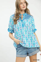 Blue and white patterned umgee mix boho puff blouse with ruffled boho puff sleeve and puff sleeve smocked detail