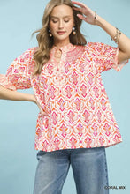 Umgee mix boho puff sleeve coral and pink blouse with ruffled neckline and puff sleeve smocked detail at collar