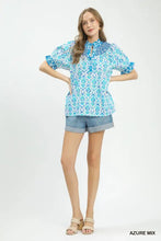 Umgee mix boho puff sleeve smocked top in blue and white patterned fabric with ruffled sleeves and a decorative collar