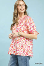 Coral mix boho puff sleeve smocked top with embroidered neckline and ruffled sleeves by umgee
