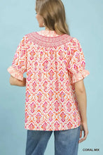 Umgee mix boho puff sleeve smocked top in coral and pink with ruffled sleeves and embroidered neckline