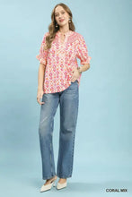 Umgee mix boho puff short-sleeved blouse with coral and white pattern and ruffled puff sleeve smocked cuffs
