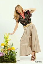 Black umgee mix floral print blouse with short sleeves pink trim and v-neckline for casual wear
