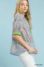 Umgee mix floral puff sleeve blouse in light blue with pink and green floral accents and lime green trim on short sleeves