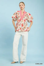 Umgee mix floral print blouse with puff sleeves and coral v-neck trim in lightweight fabric for stylish wear