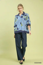 Blue and white striped blouse with navy mix floral stripe embroidery and scalloped hem by umgee