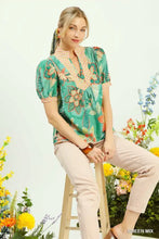 Green floral print umgee mixed abstract blouse with peach lace trim and puff sleeves for stylish wear