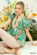 Umgee mixed abstract green floral print blouse with peach and orange accents high neckline and short puffed sleeves