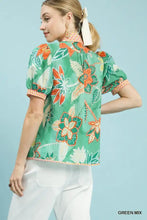 Green floral print umgee mixed abstract blouse with puff sleeves and embroidered trim for stylish wear
